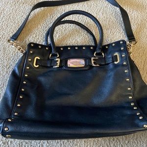 Black Michael Kors bag with gold studs